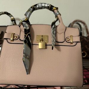 Elegant Pink Handbag with Scarf Detail